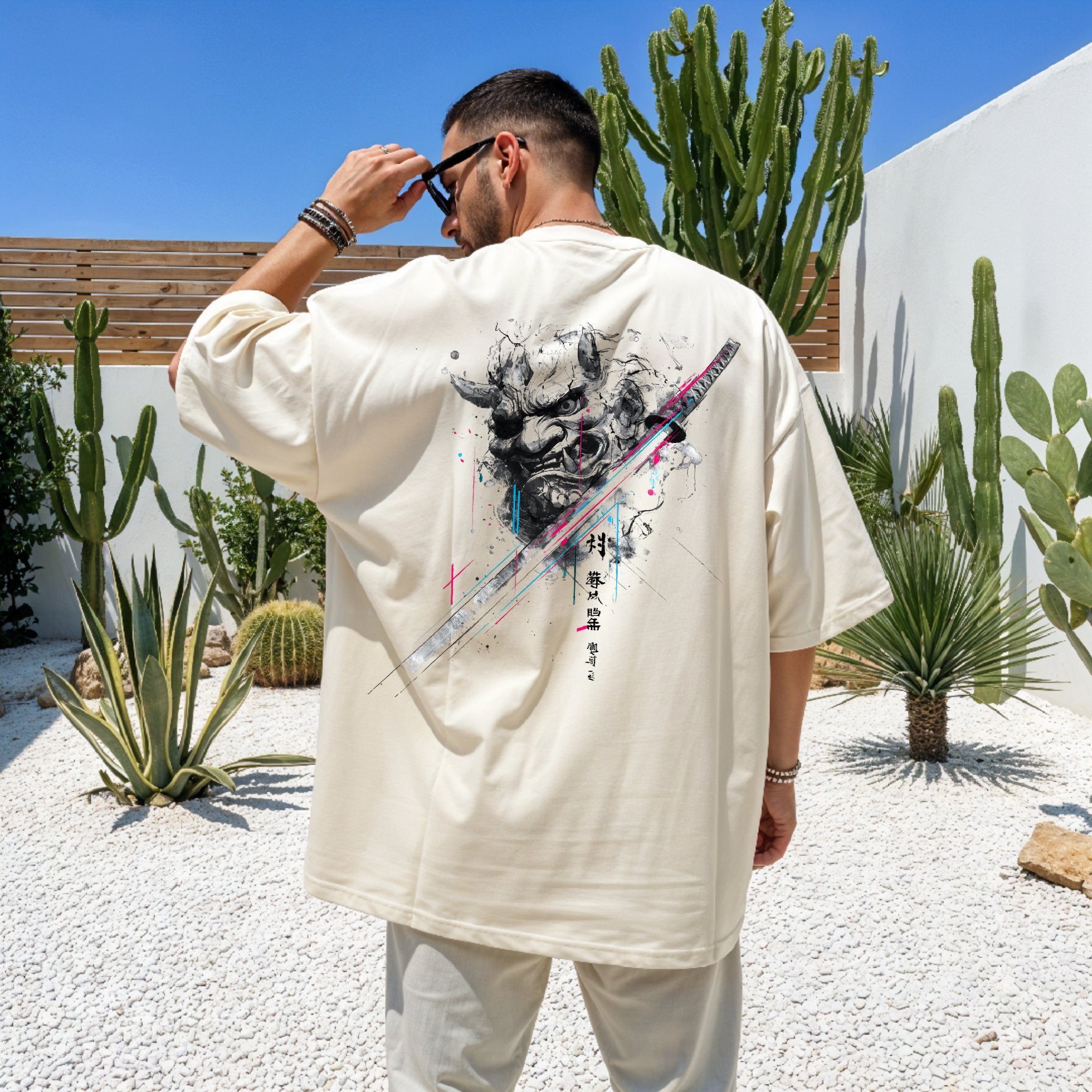 Back print of oversized t-shirt featuring sumi-e Oni mask with katana and subtle neon glitch accents.