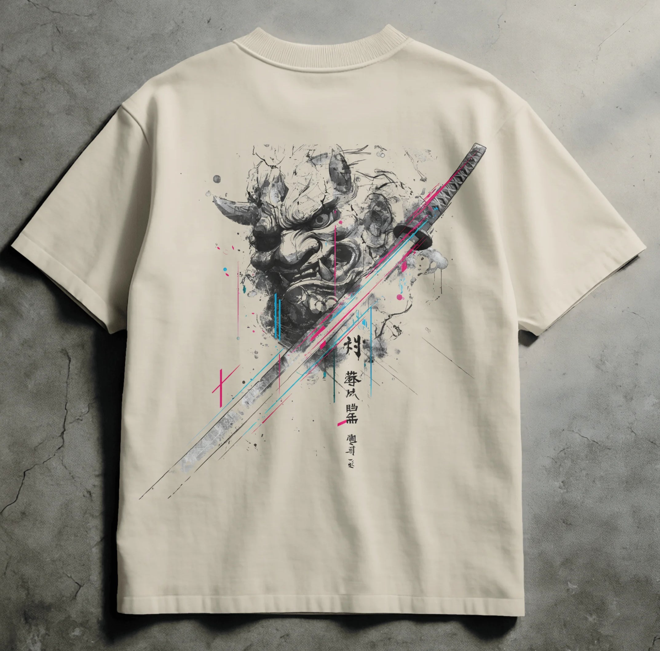 Ivory Comfort Colors streetwear tee with sumi-e oni mask design fractured by a katana, neon cyan and magenta glitch accents, Spirit Ink Blade of the Veiled Oni design. Available only in ivory