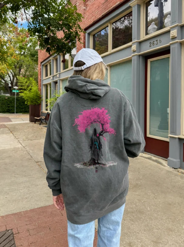 Lifestyle shot wearing Wraith Beneath Sakura Japanese samurai art streetwear hoodie.