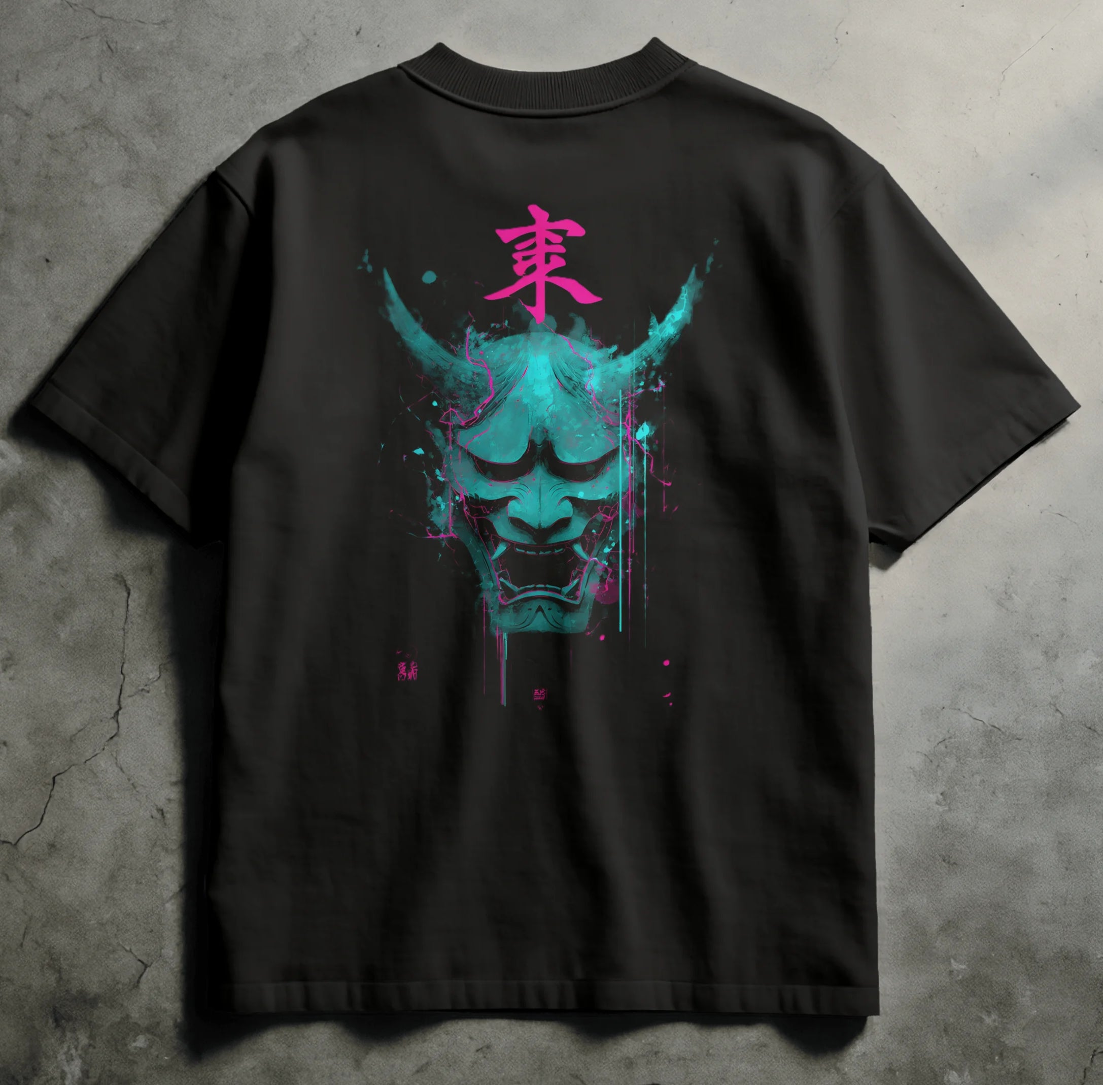 Black t-shirt with a colorful design on the back against a gray concrete background