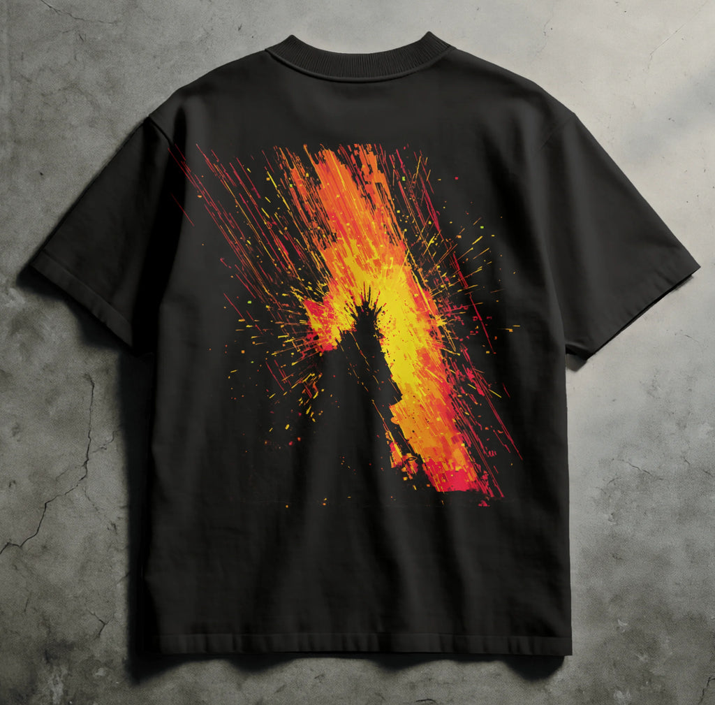 Black premium streetwear tee with sumi-e ink and fire design of Kagutsuchi, Japanese fire god, emerging in fractured flames and eclipse shadow with gold halo accents