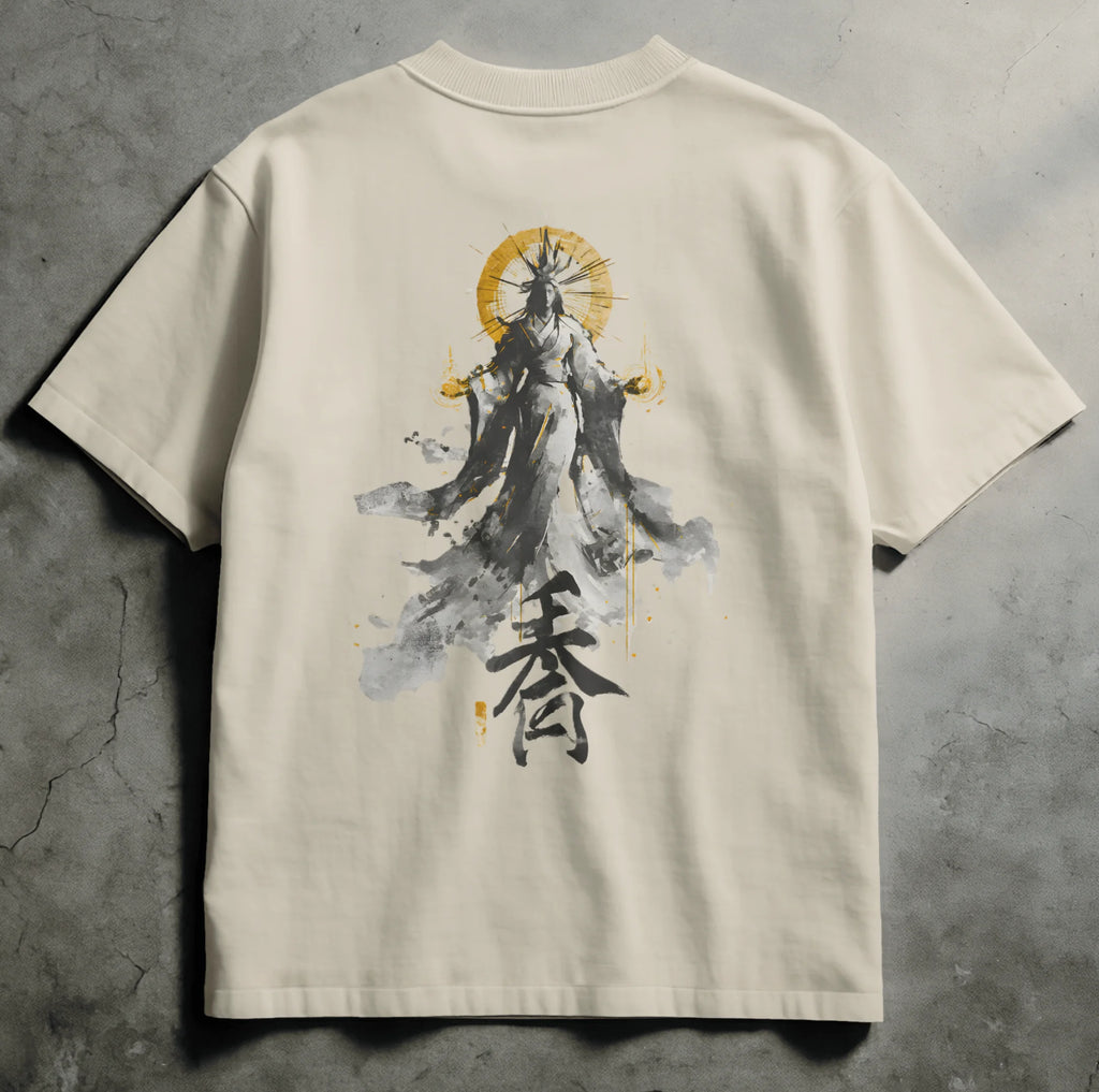 Ivory Comfort Colors streetwear tee with sumi-e faceless monk figure crowned by a golden halo, holding flames, with black kanji script below. Spirit Ink design. Available in black and ivory