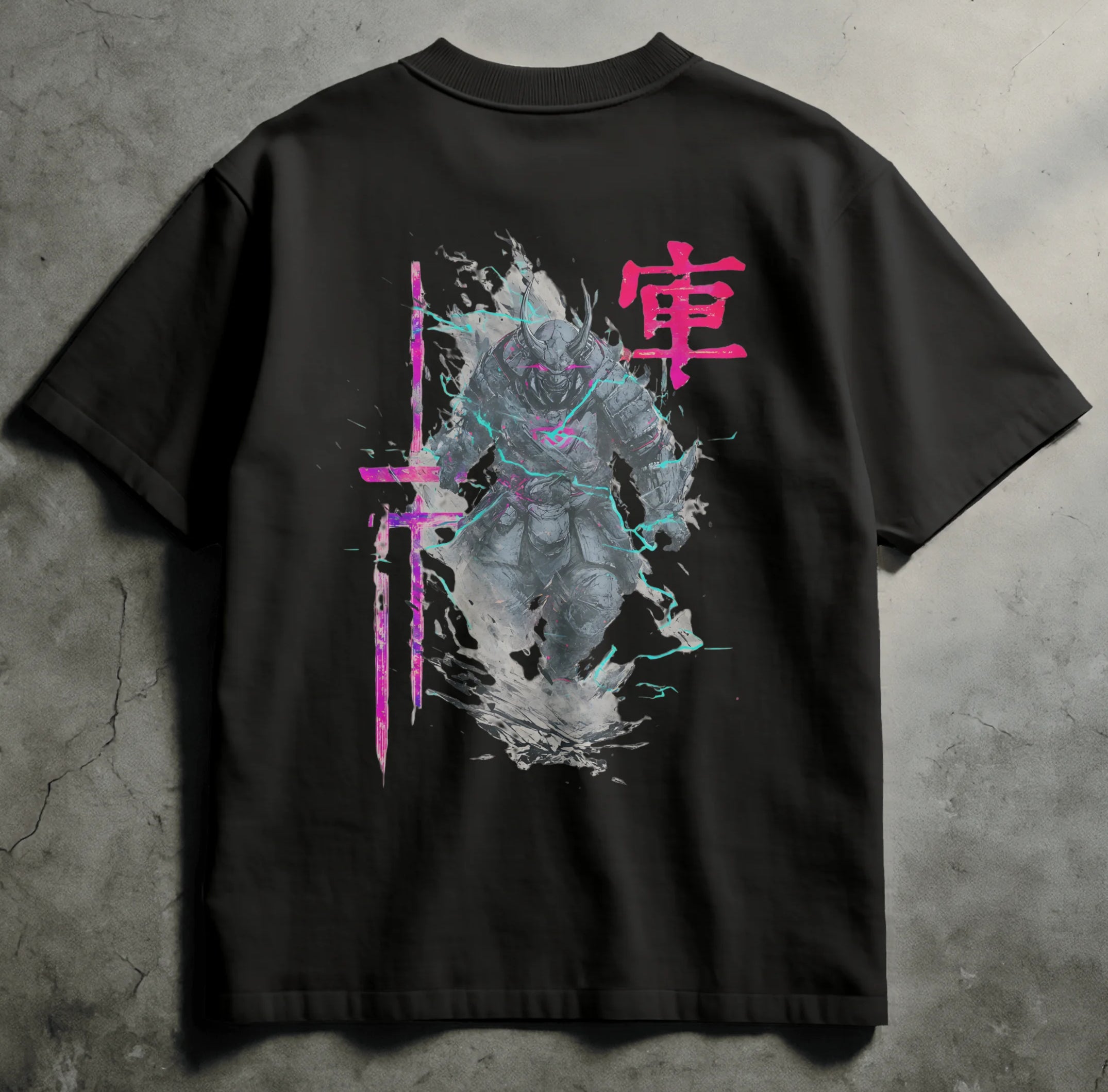 Black t-shirt with a graphic design on the back against a concrete wall background
